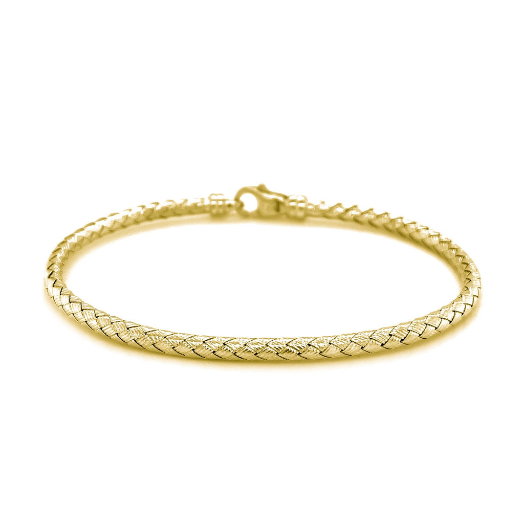 Fancy weave bangle in 14k yellow gold, minimalist design, showcasing luxury craftsmanship and timeless elegance.