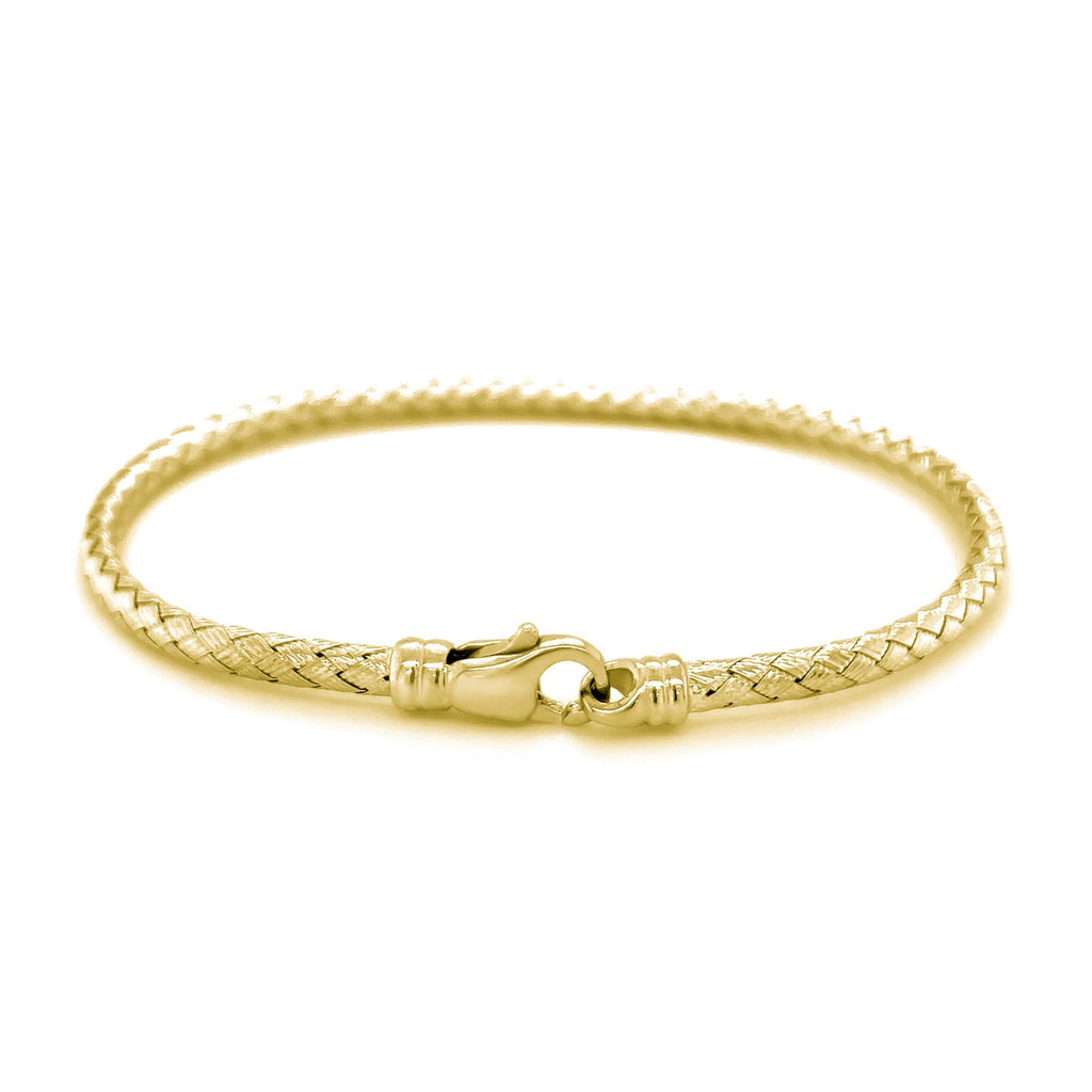 Fancy weave bangle in 14k yellow gold, minimalist design with luxurious elegance, perfect for any occasion.