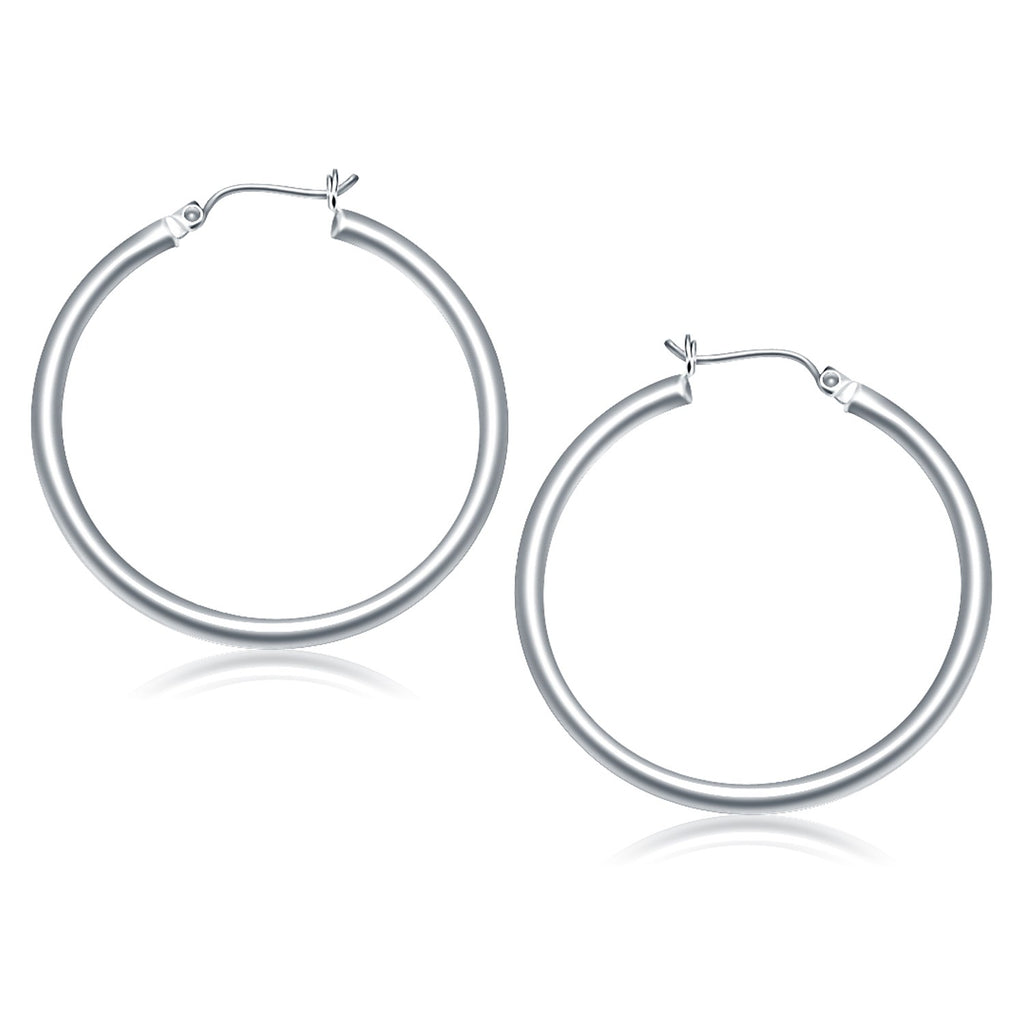 14k white gold polished hoop earrings with a sleek modern design, perfect for elegant everyday wear.