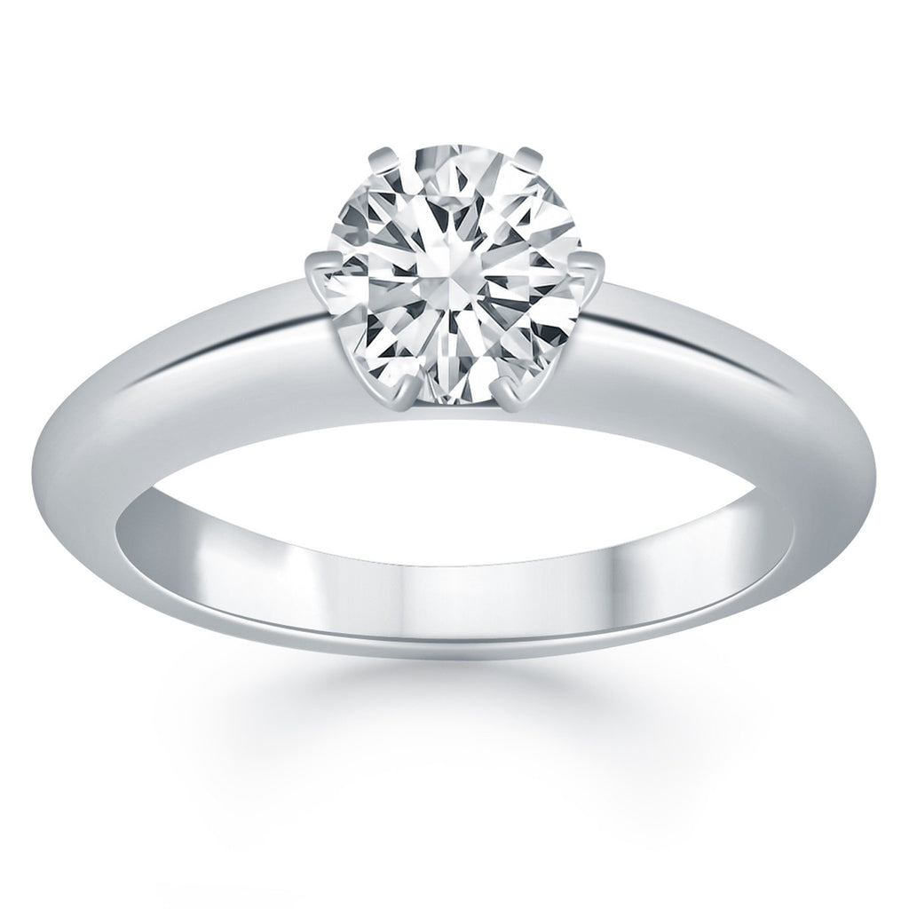 14k white gold cathedral engagement ring featuring a stunning round diamond solitaire for an elegant proposal.