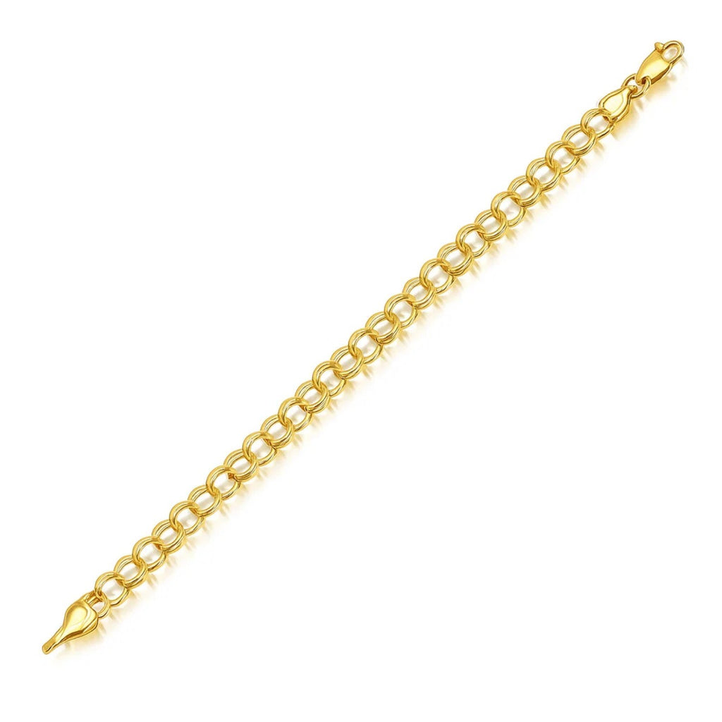 14k yellow gold charm bracelet featuring a classic design with a polished finish and stud detailing.
