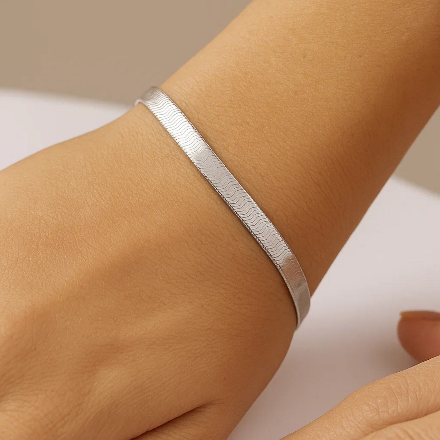 14k white gold super flex herringbone bracelet with modern design and elegant chain detail, perfect for luxury styling.