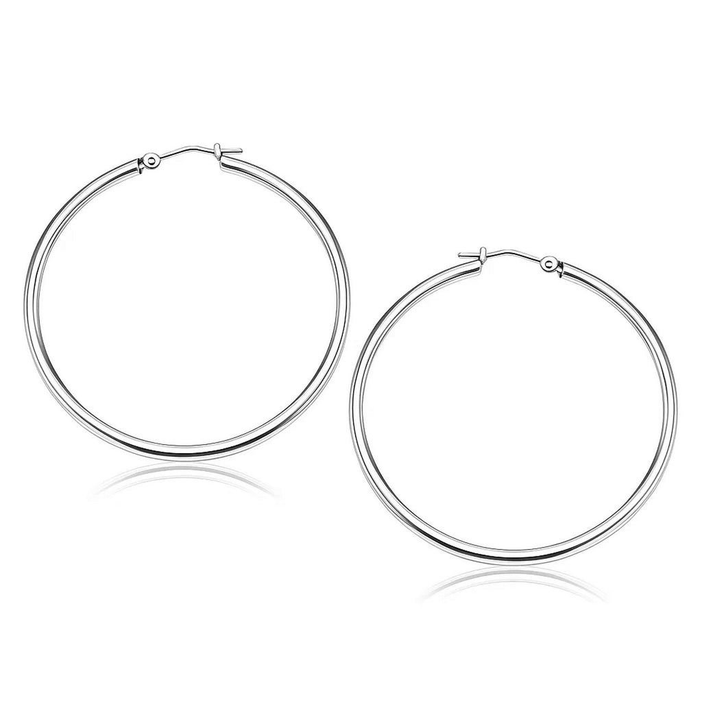 14k white gold polished hoop earrings with a sleek modern design, perfect for elegant everyday wear.