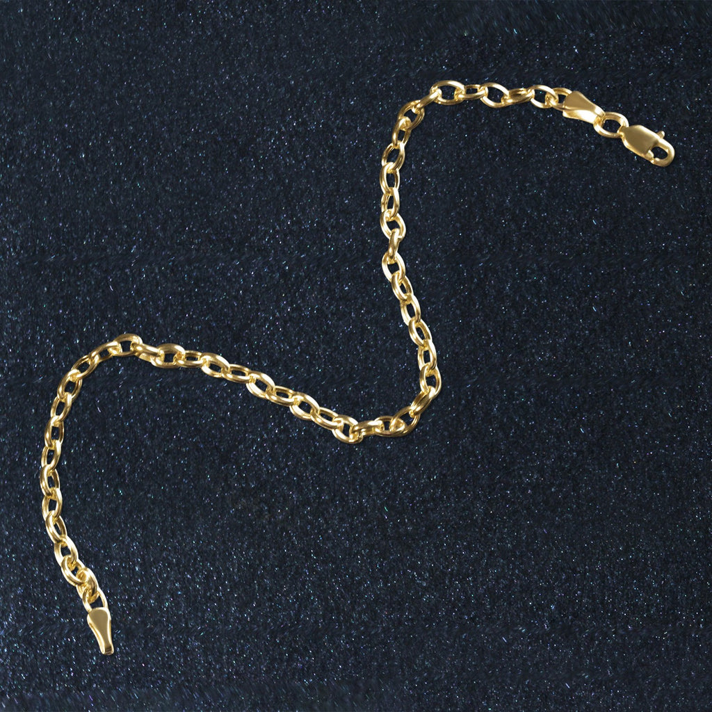 14k yellow gold oval rolo bracelet featuring a modern chain design, perfect for elegant layering or standalone wear.