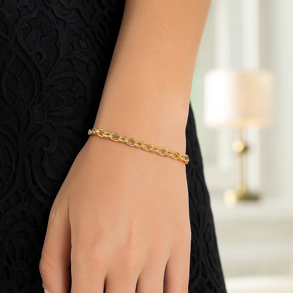 14k yellow gold oval rolo bracelet with modern chain design, showcasing elegance and timeless luxury.
