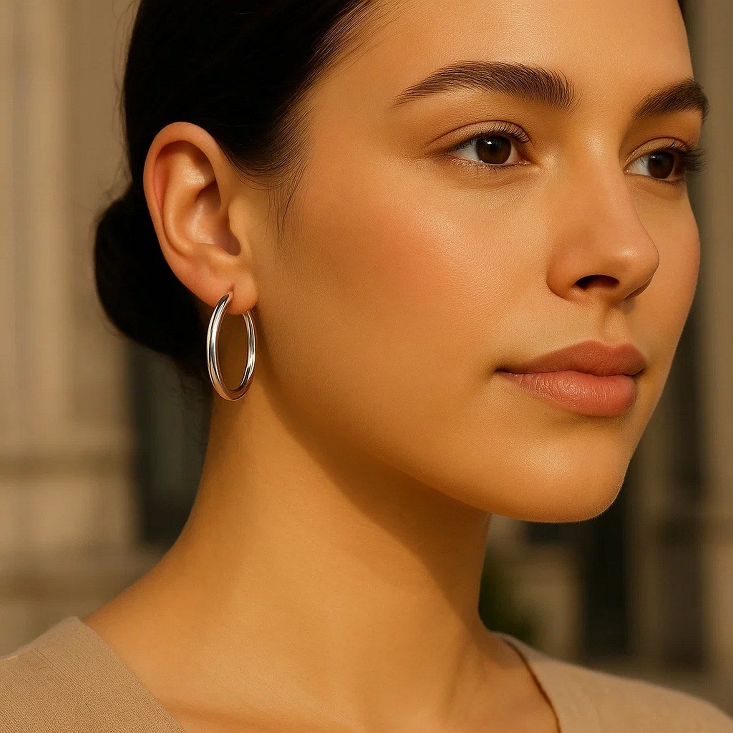 Polished 14k white gold modern hoop earrings showcasing a sleek, contemporary design for elegant style.