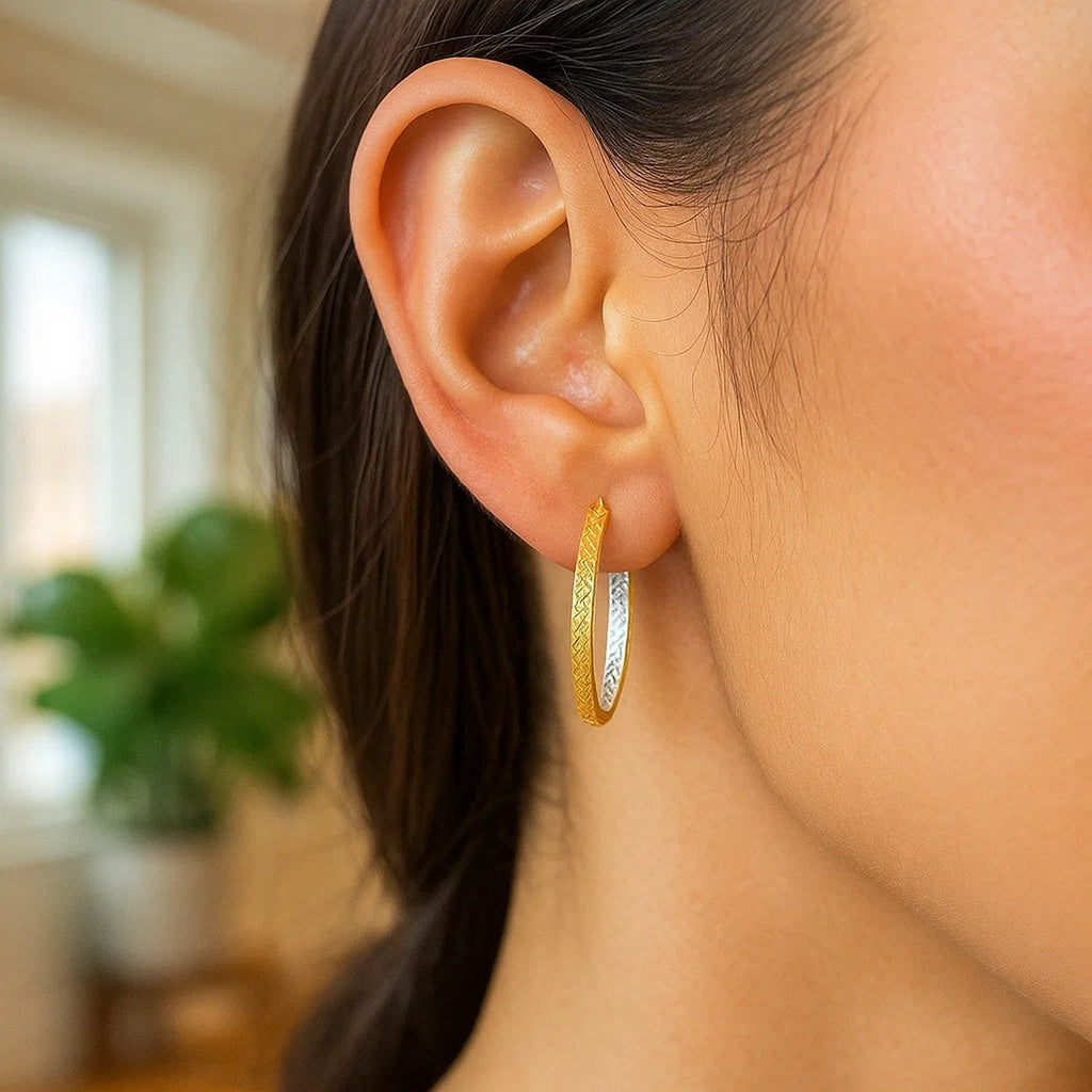14K two-tone yellow and white gold petite patterned hoop earrings, elegantly designed for timeless luxury.