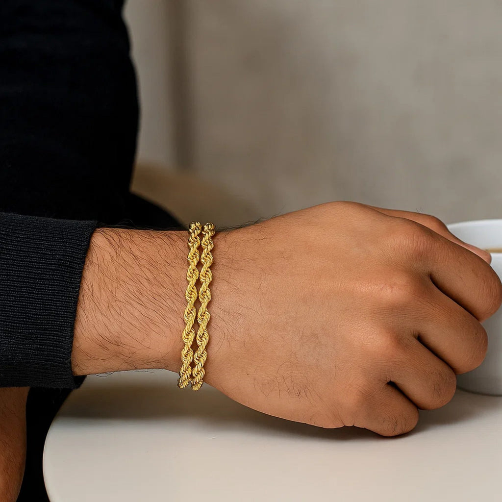 14k yellow gold dual row rope bracelet showcasing elegant craftsmanship and luxurious design, perfect for any occasion.