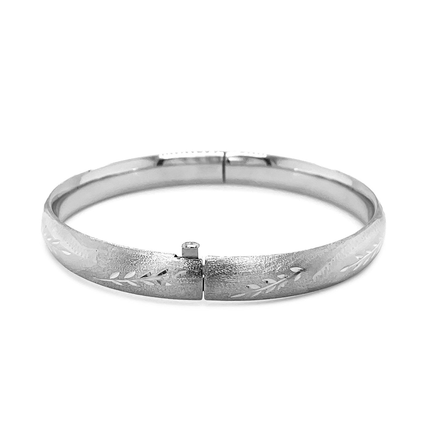 Classic floral carved bangle in 14k white gold, featuring intricate detailing and luxurious 8.00 mm width.