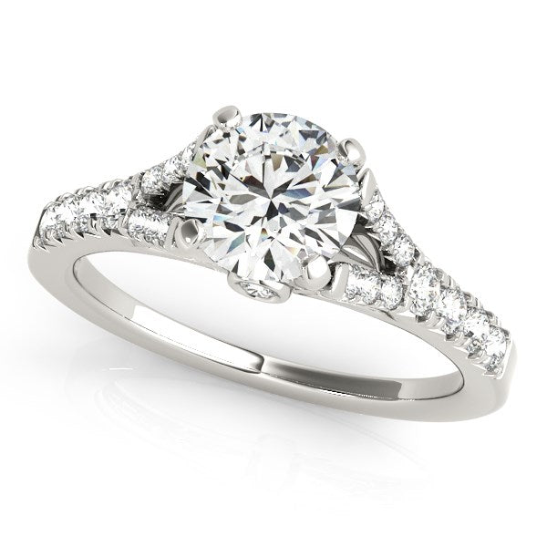 14k white gold split shank engagement ring featuring a prong-set round diamond, exuding timeless elegance.