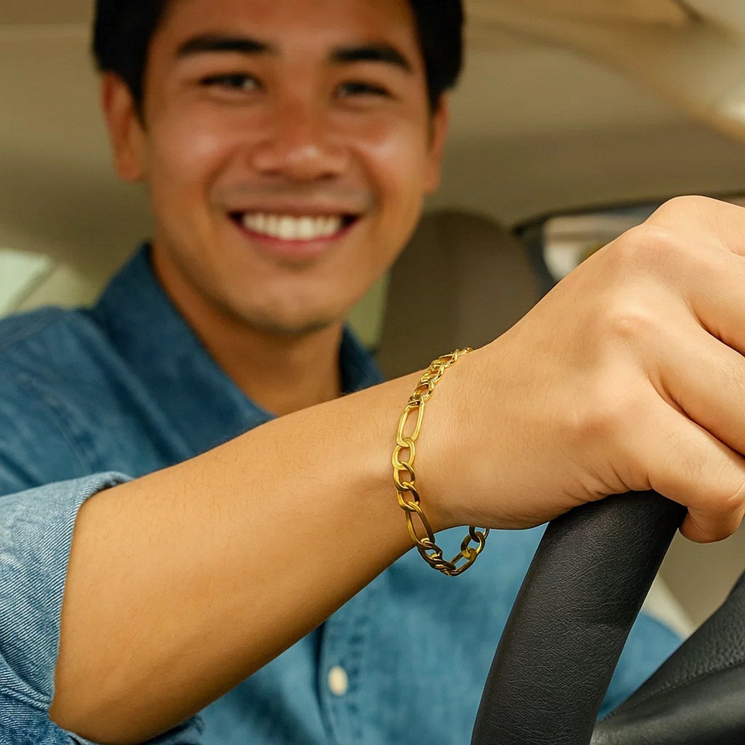14k yellow gold Lite Figaro bracelet featuring modern links and a sleek design, perfect for elegant layering.