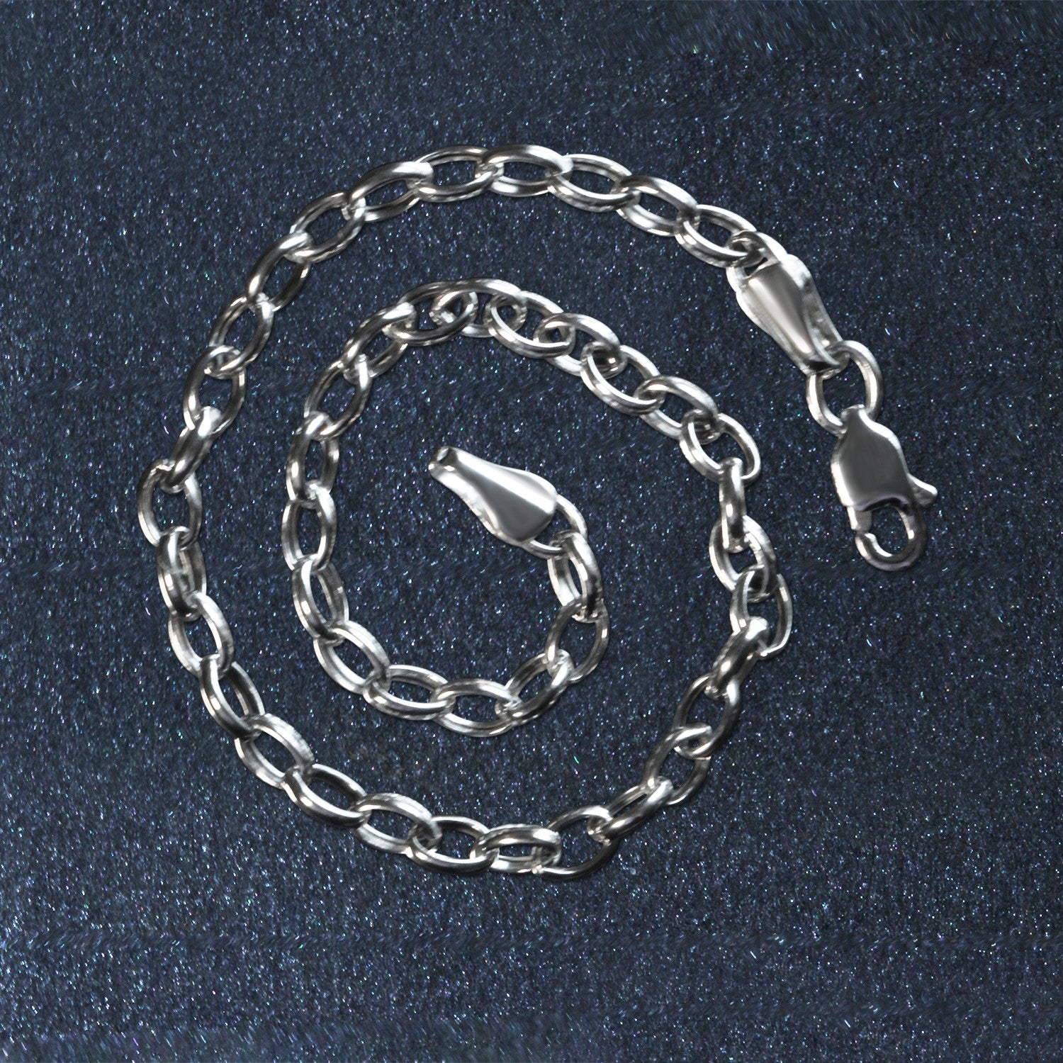 14k white gold oval rolo bracelet with modern link design, showcasing elegance and luxury in every detail.