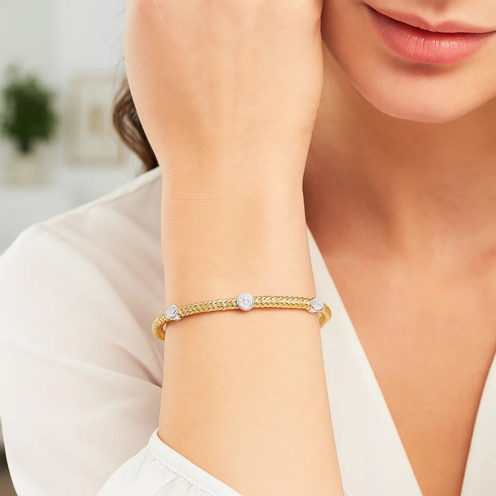 14k two-tone gold bracelet featuring diamond accents in a modern basket weave design, 3.80 mm wide.
