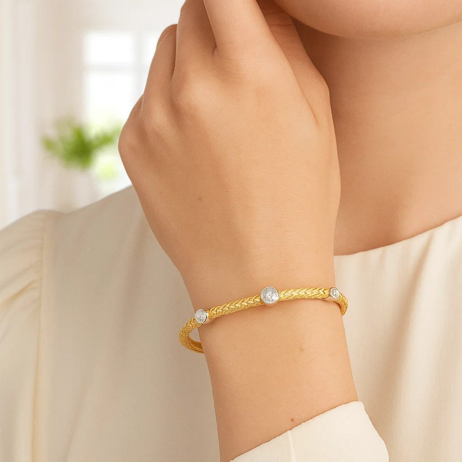 14k two-tone gold bracelet featuring diamond accents in a modern basket weave design, 3.80 mm width.