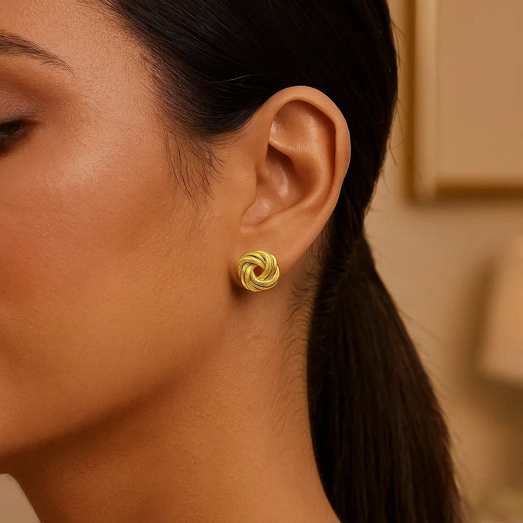 14k yellow gold textured polished stud earrings exuding elegance and sophistication for any occasion.