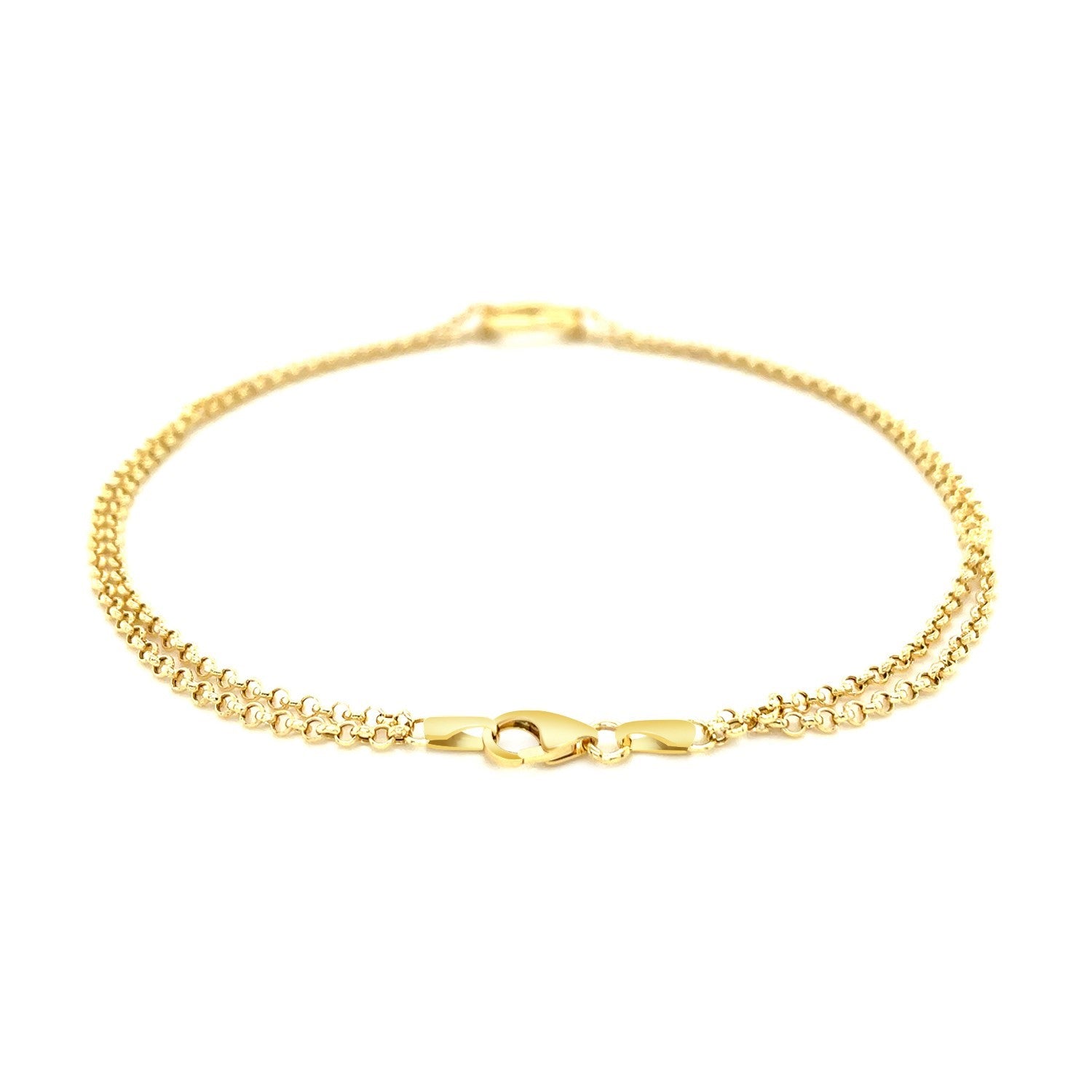 14k yellow gold double rolo chain anklet featuring an elegant open heart station for a modern, luxurious touch.