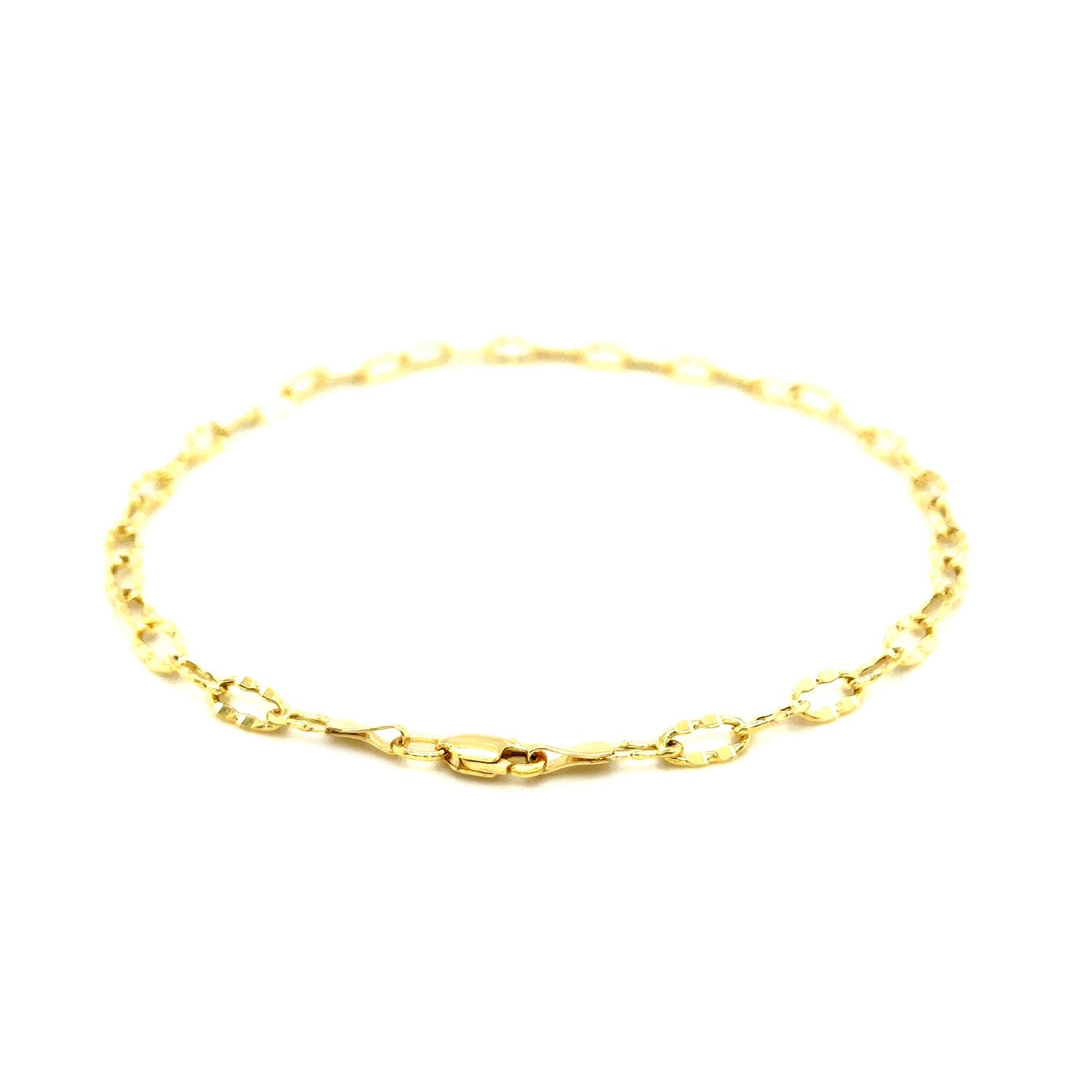 14k yellow gold anklet featuring flat hammered oval links in a modern design, perfect for elegant summer styling.