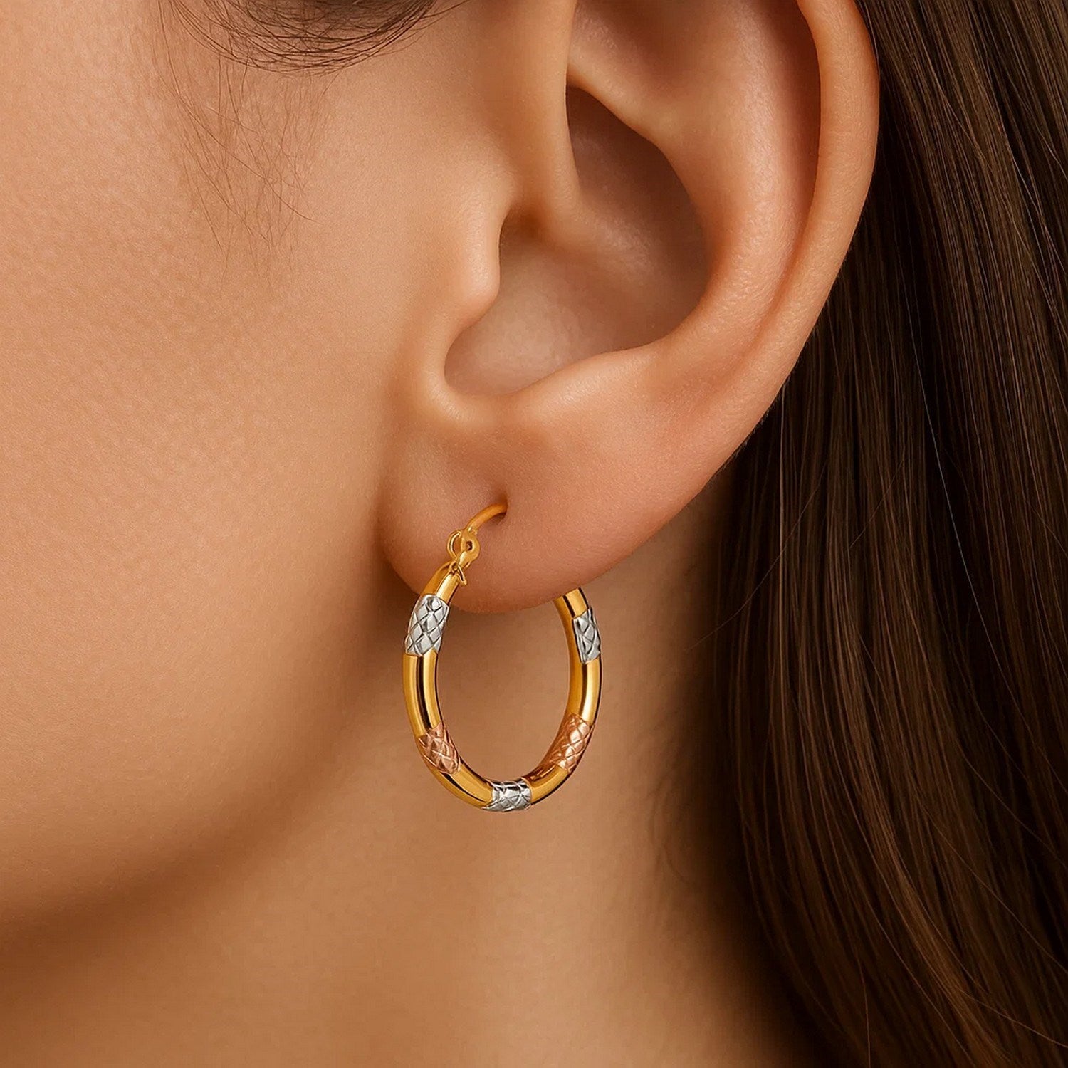 14k yellow gold tri-color diamond cut hoop earrings showcasing a modern design with exquisite craftsmanship.