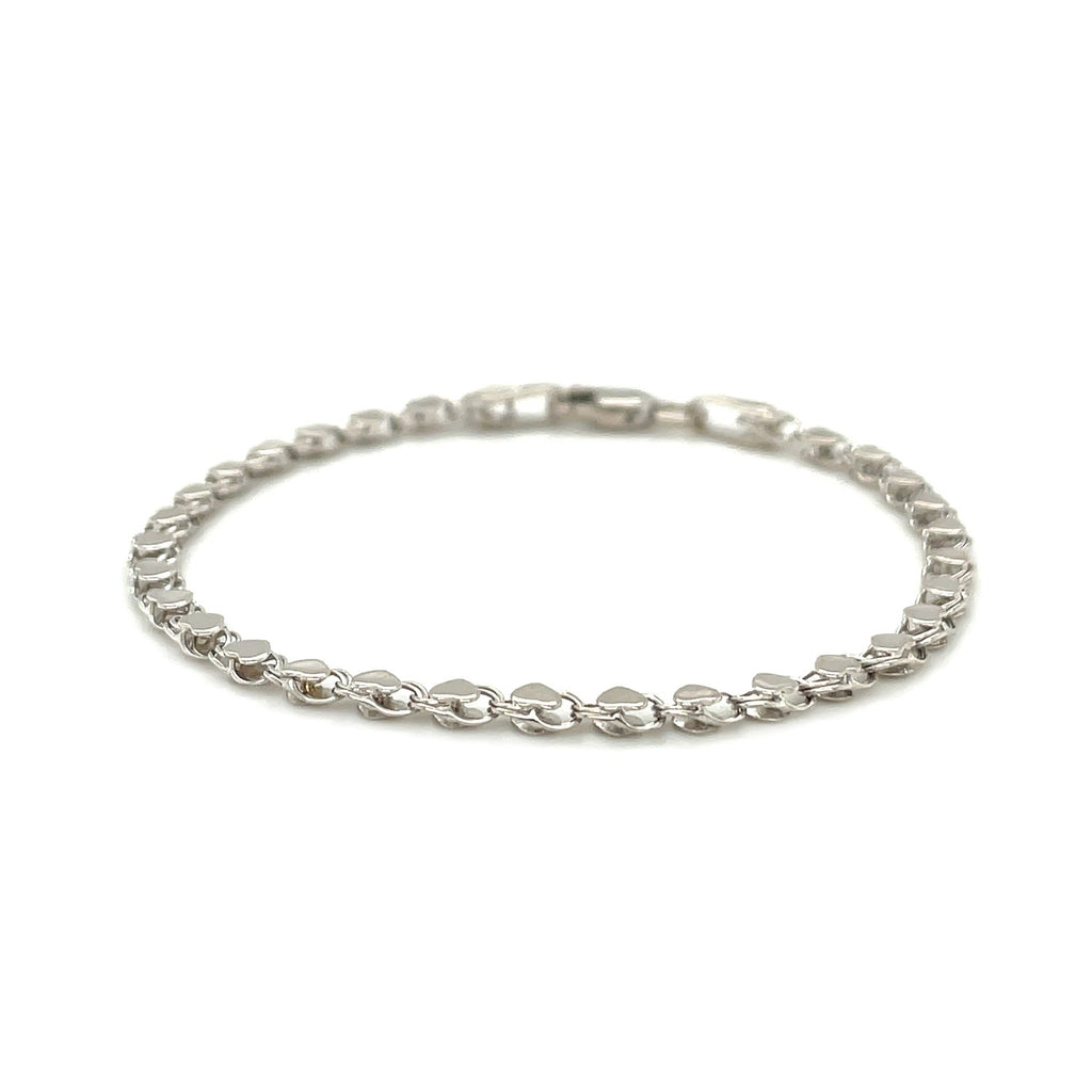 14k white gold minimalist heart bracelet featuring elegant chain links, perfect for sophisticated everyday wear.