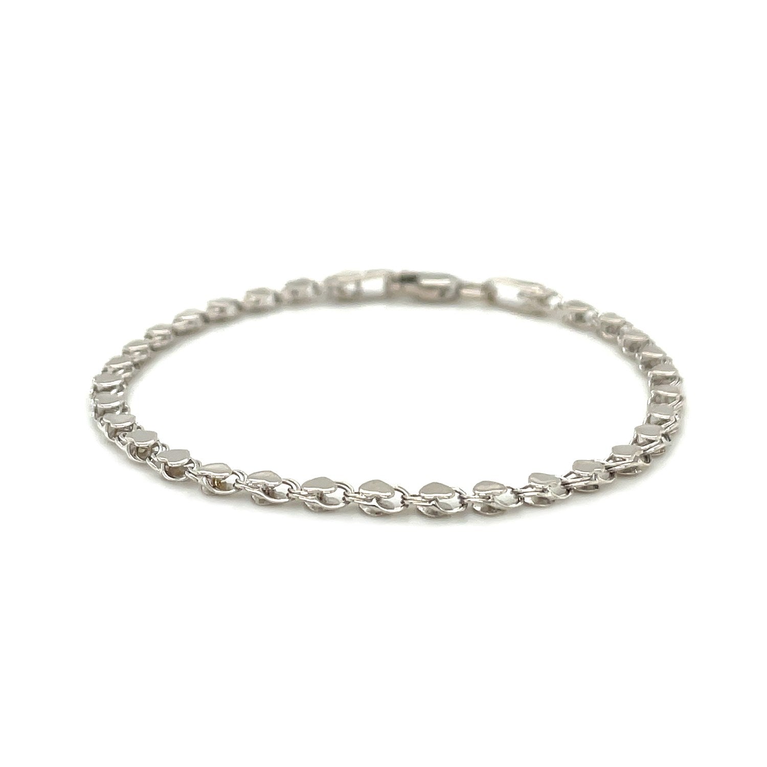 14k white gold minimalist heart bracelet featuring elegant chain links, perfect for sophisticated everyday wear.