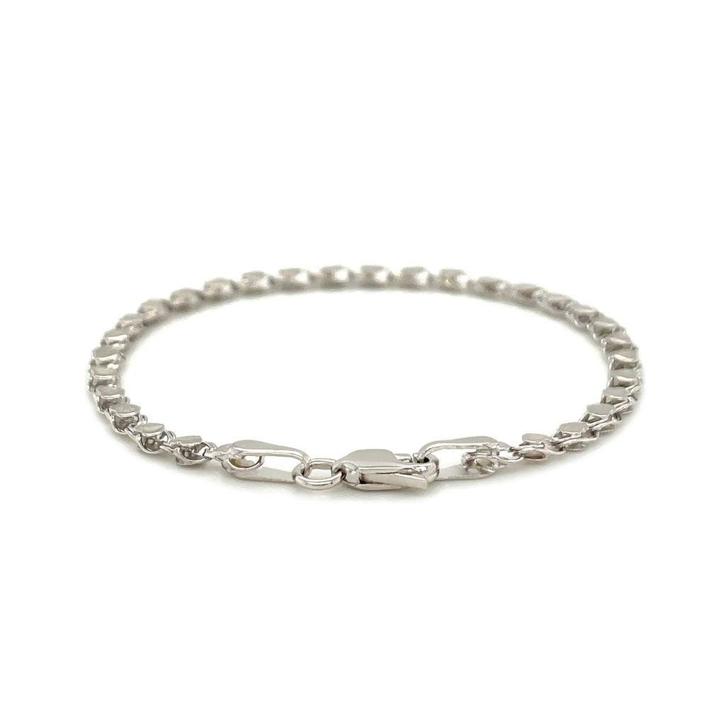 14k white gold minimalist heart bracelet with elegant chain links, perfect for refined luxury style.