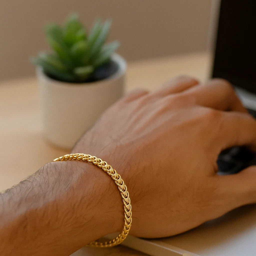 14k yellow gold square Franco bracelet featuring classic stud links, elegantly crafted for timeless luxury.