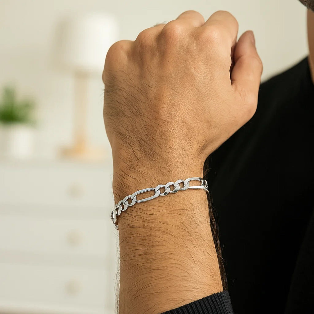 Elegant 14k white gold Figaro bracelet featuring a refined chain design, perfect for luxury jewelry enthusiasts.