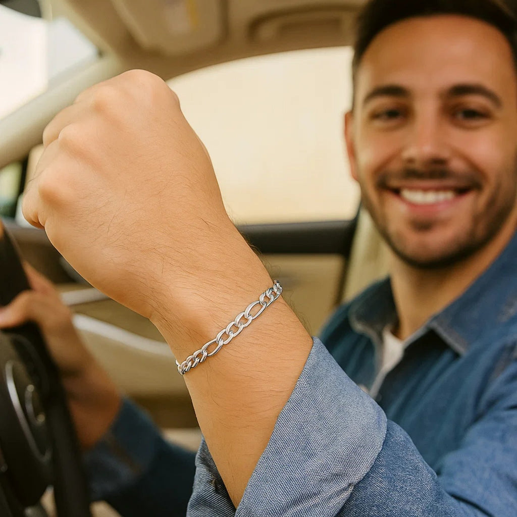 Elegant 14k white gold Figaro bracelet featuring a sleek chain design, perfect for luxury jewelry enthusiasts.