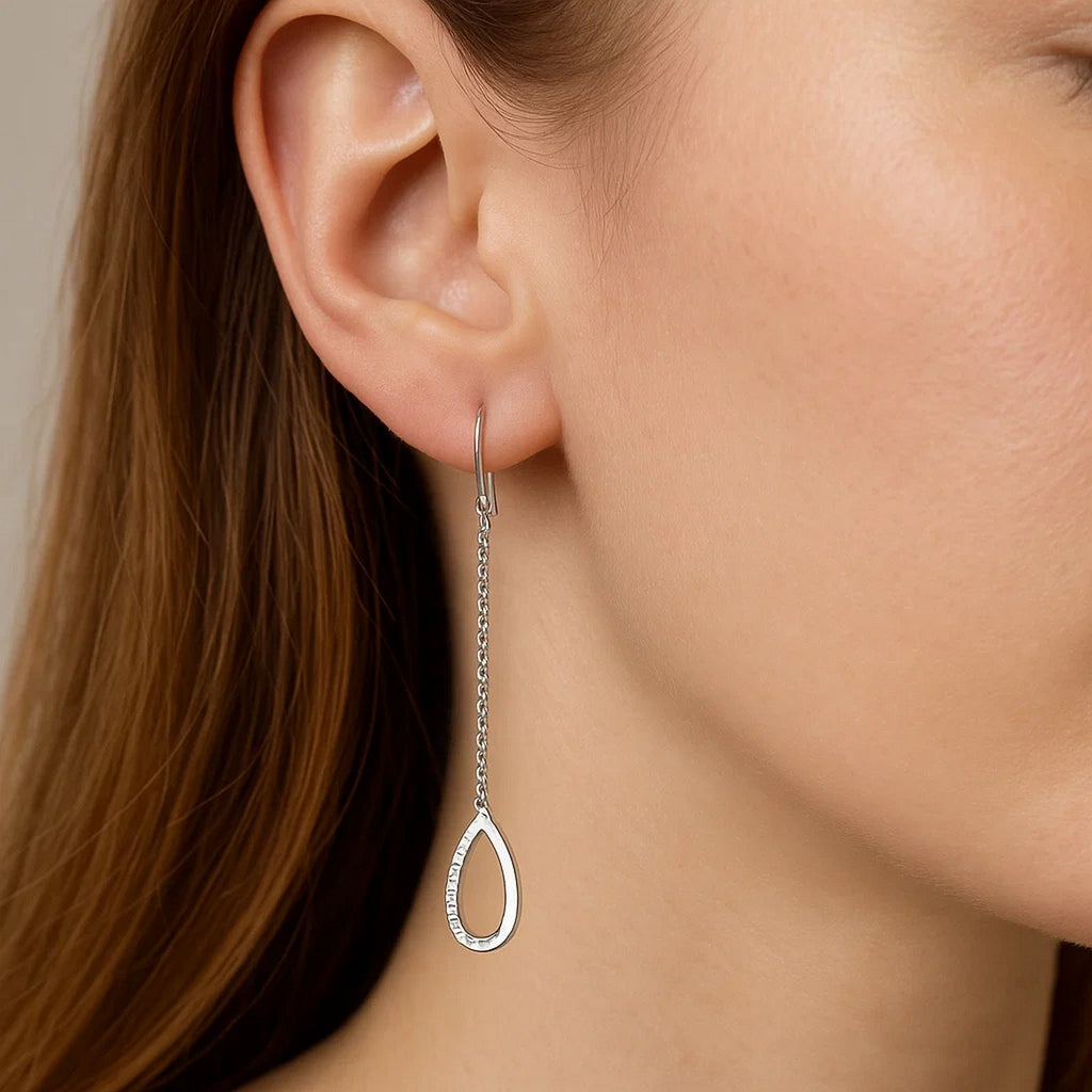 Elegant 14k white gold textured drop earrings with a chic chain design, perfect for sophisticated occasions.