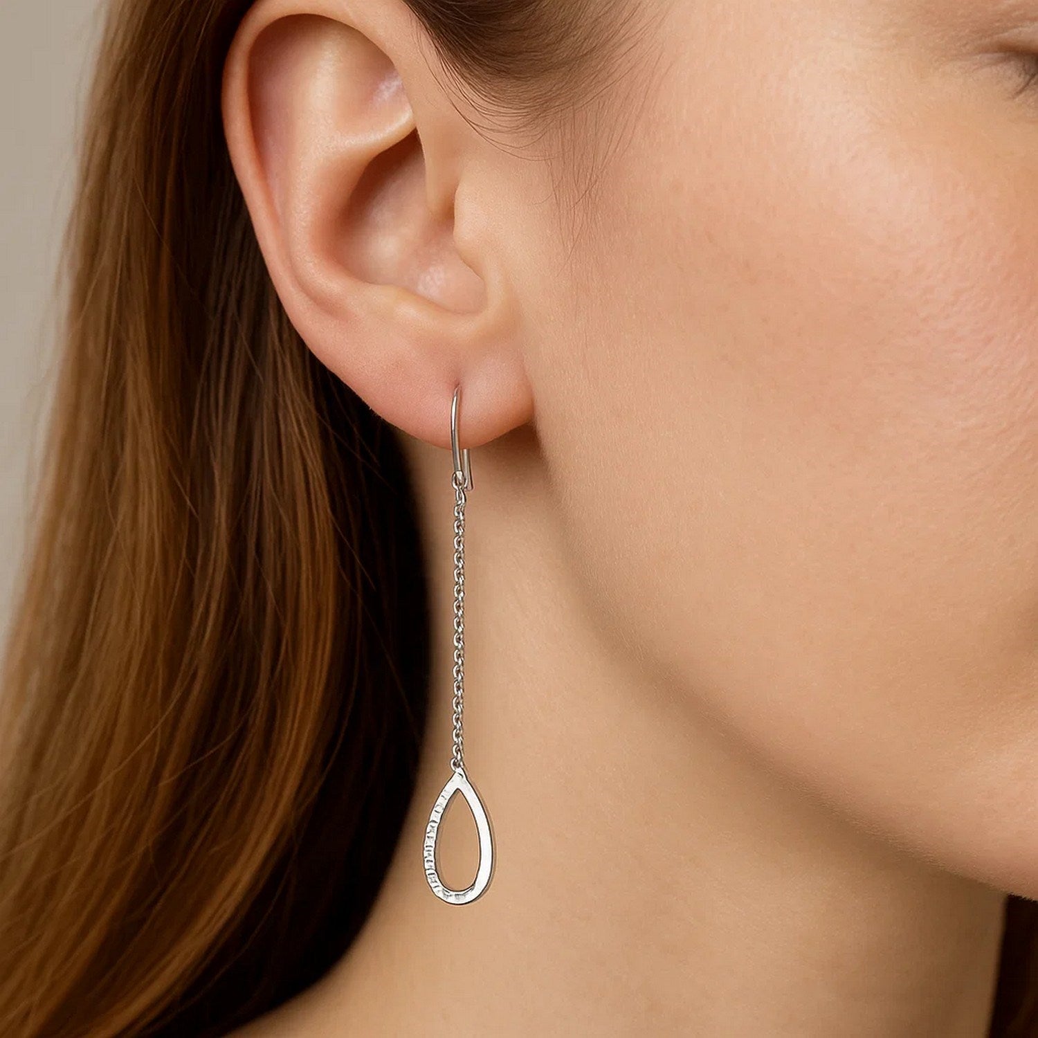 Elegant 14k white gold textured drop earrings with a chic chain design, perfect for sophisticated occasions.
