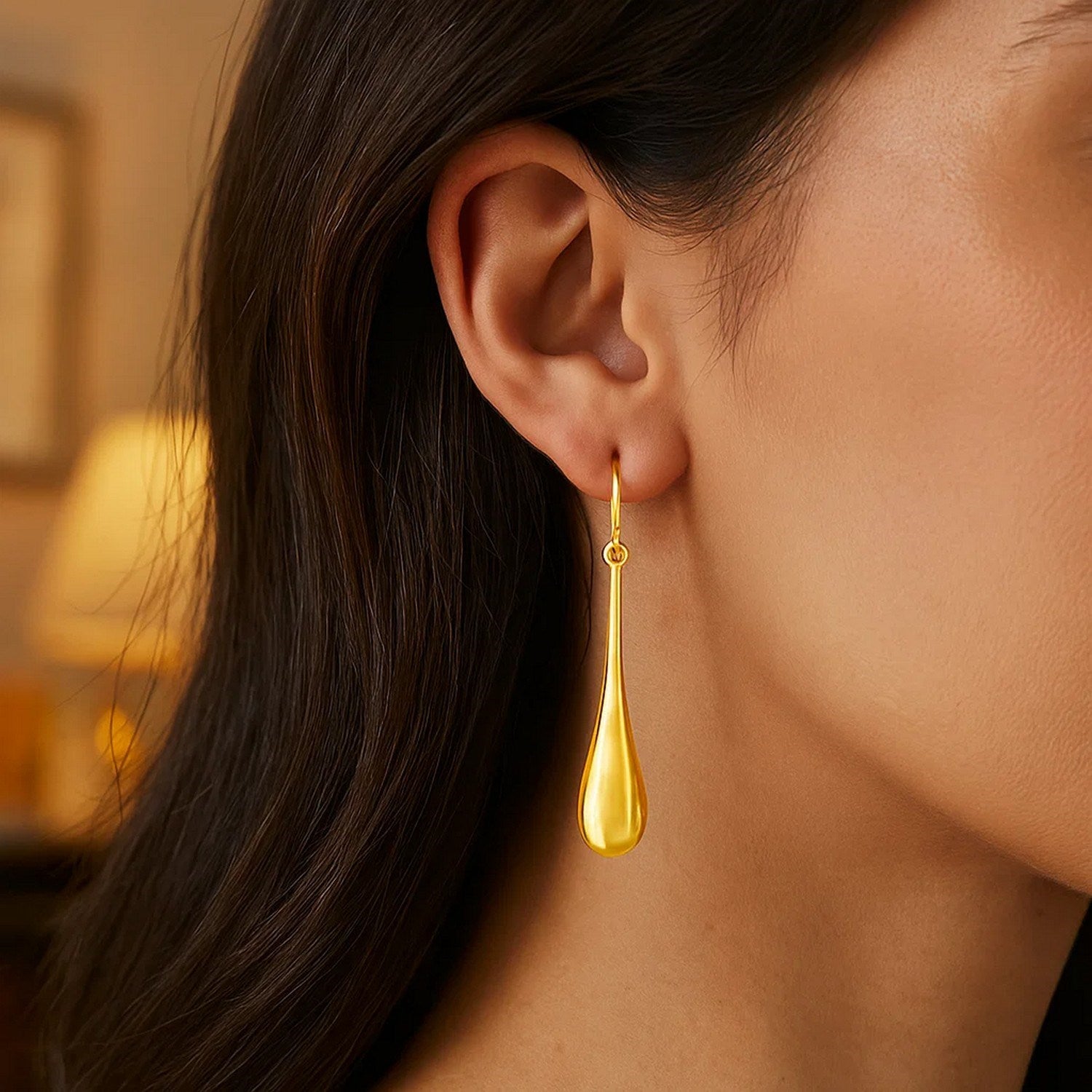 14k yellow gold minimalist drop earrings showcasing elegant design and refined craftsmanship for sophisticated style.