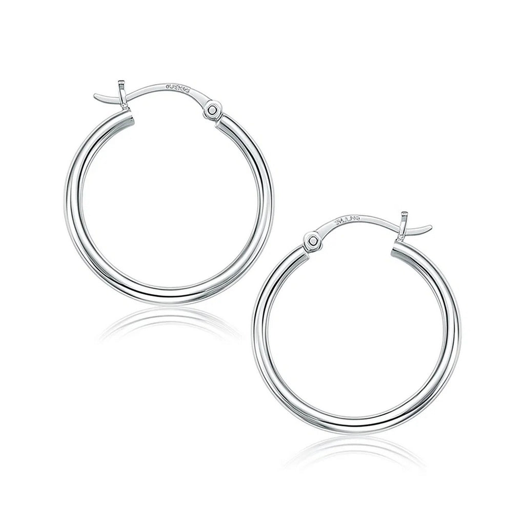 14k white gold polished hoop earrings with a sleek modern design, perfect for elegant everyday wear.