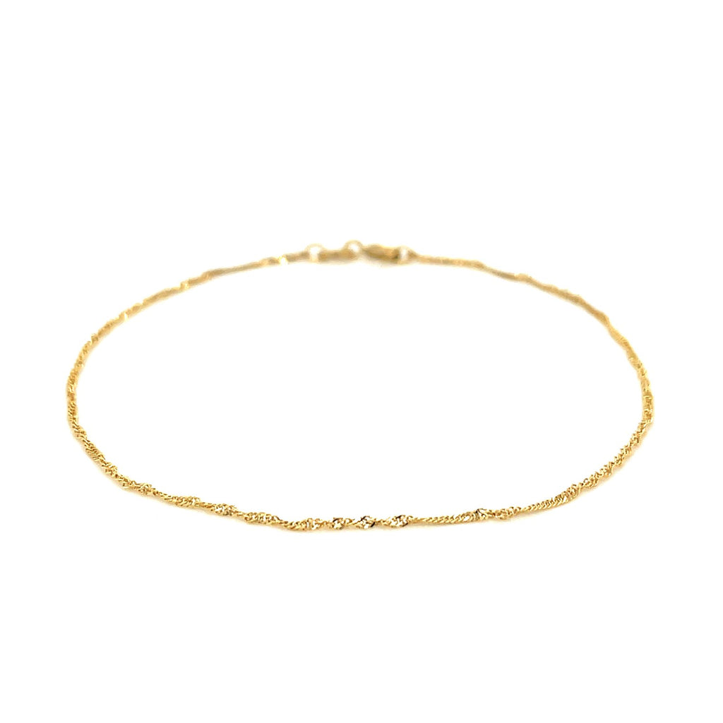14k yellow gold Singapore bracelet featuring a classic chain design, perfect for elegant layering or solo wear.
