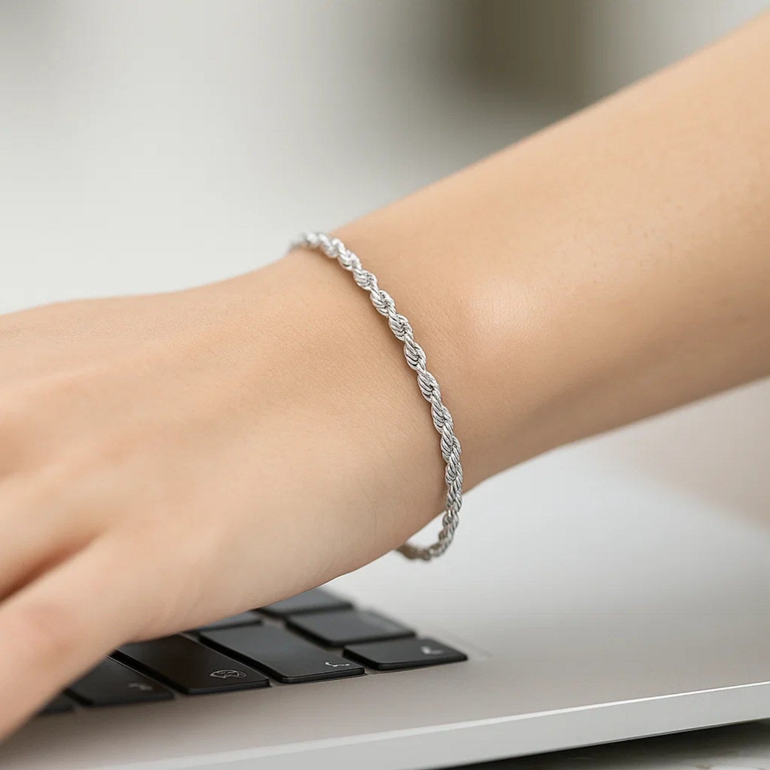 14k white gold solid diamond cut rope bracelet featuring elegant chain links, perfect for sophisticated styling.