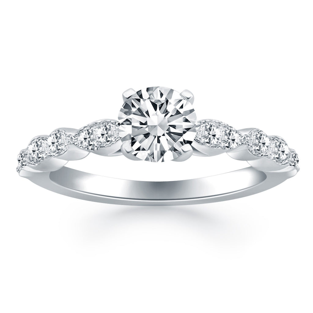 14k white gold fancy shaped diamond engagement ring with modern prong setting and exquisite round diamonds.