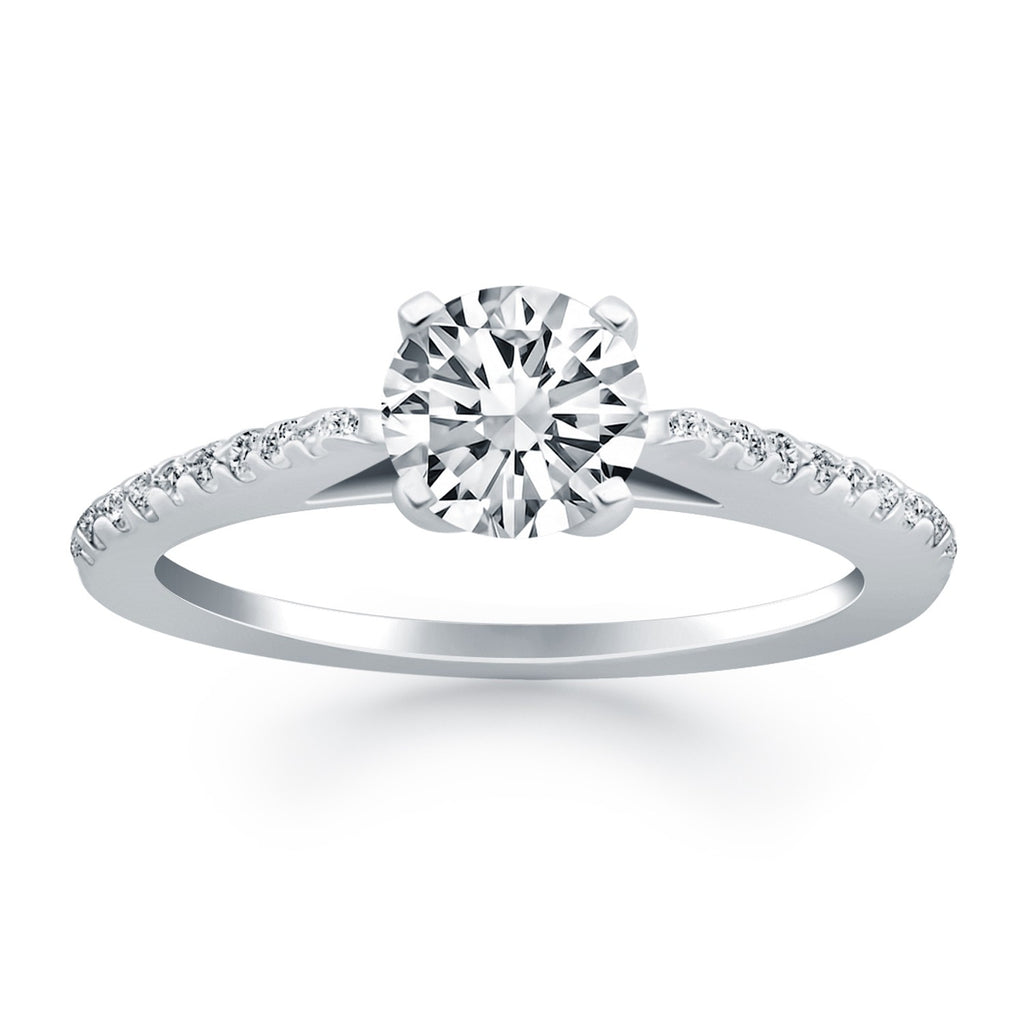 14k white gold micro prong diamond cathedral engagement ring with a stunning round center stone, embodying modern elegance.