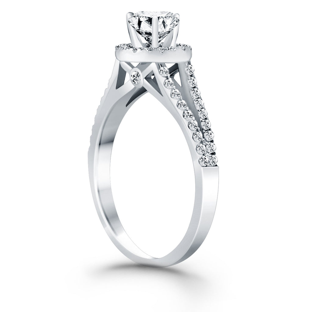 14k white gold diamond halo split shank engagement ring featuring a stunning round center stone in modern design.