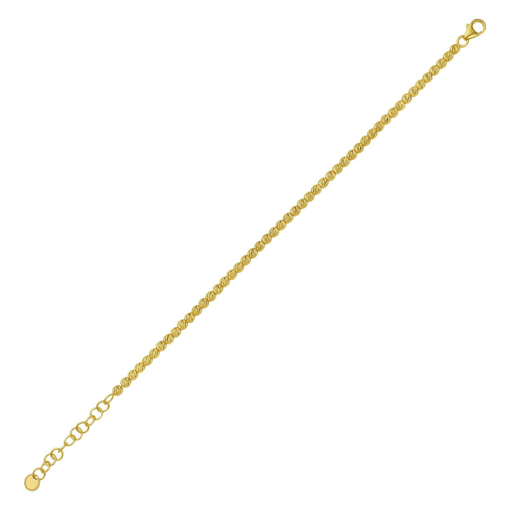 14k yellow gold bead bracelet featuring elegant 3.00 mm beads, perfect for layering or wearing alone.