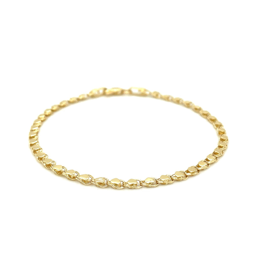 14k yellow gold heart bracelet featuring a modern link chain design, perfect for elegant layering or standalone wear.
