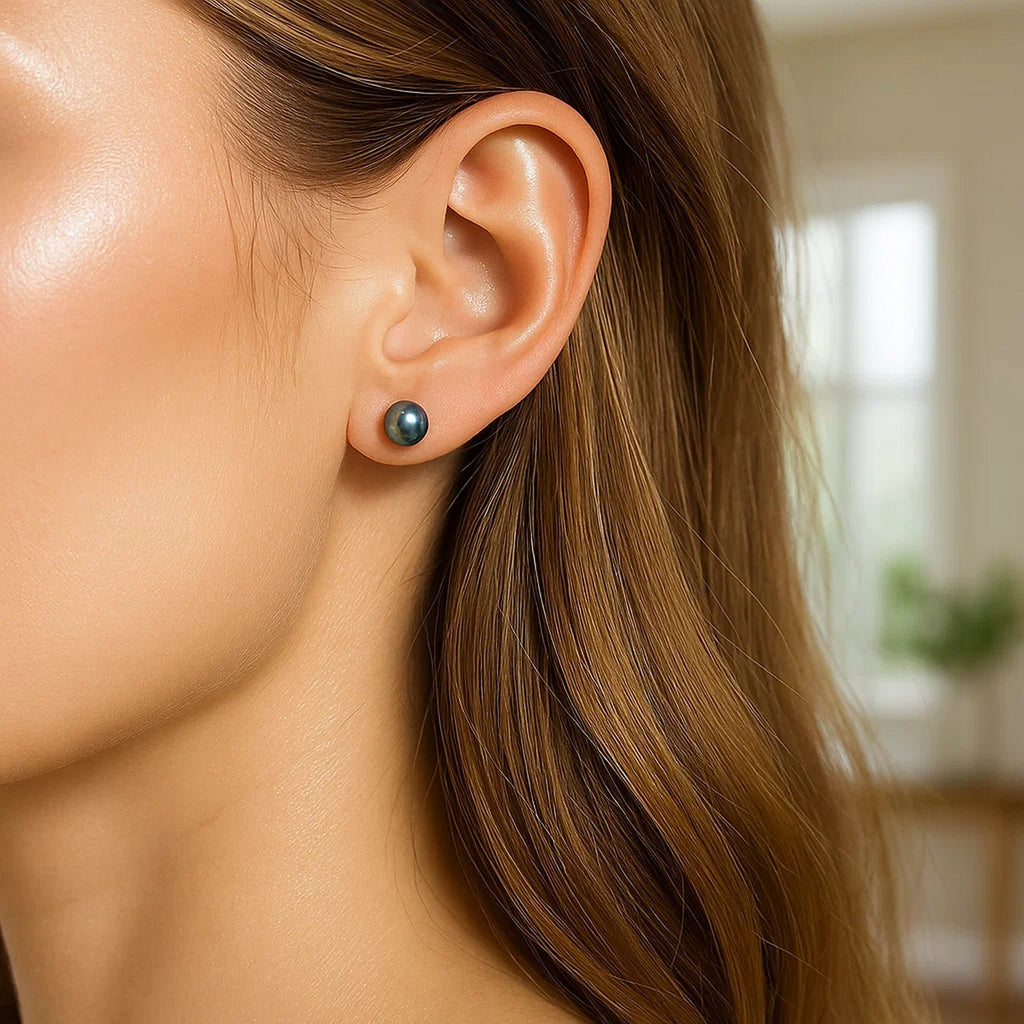 14k yellow gold minimalist stud earrings featuring 6mm cultured black pearls, perfect for elegant everyday wear.