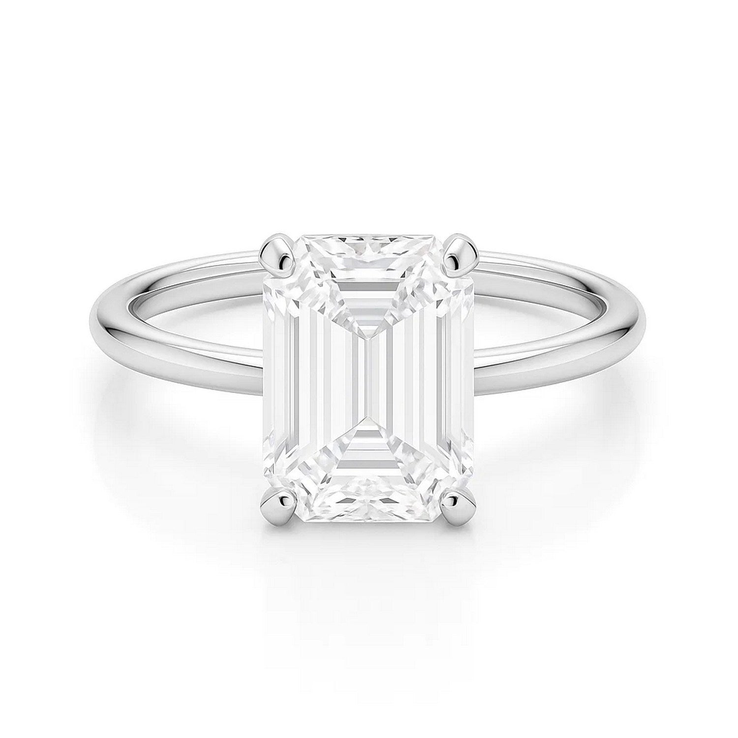 14k white gold solitaire ring featuring a 5 carat emerald and IGI G/VS1 diamond in a modern prong setting.