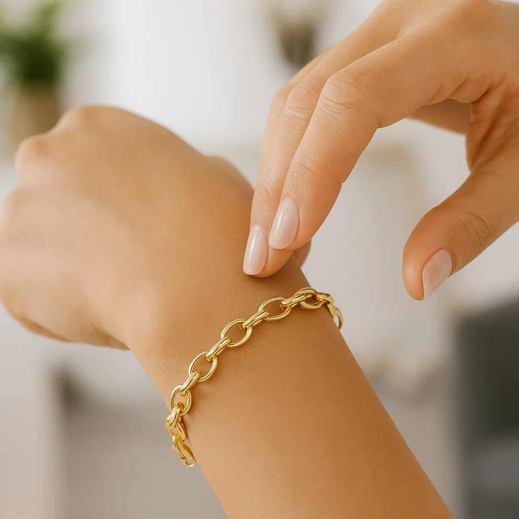 14k yellow gold oval rolo bracelet with modern link design, showcasing elegance and luxury in every detail.