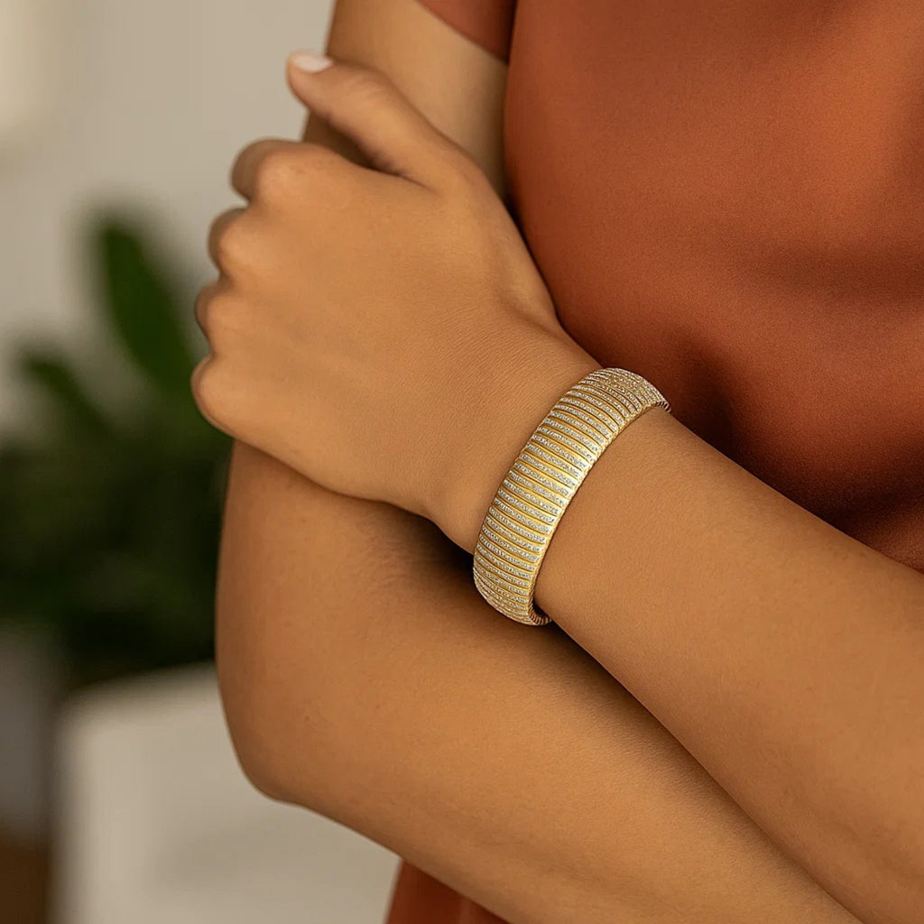 14k yellow gold bold diamante flex bracelet featuring a luxurious, elegant design with shimmering diamond accents.