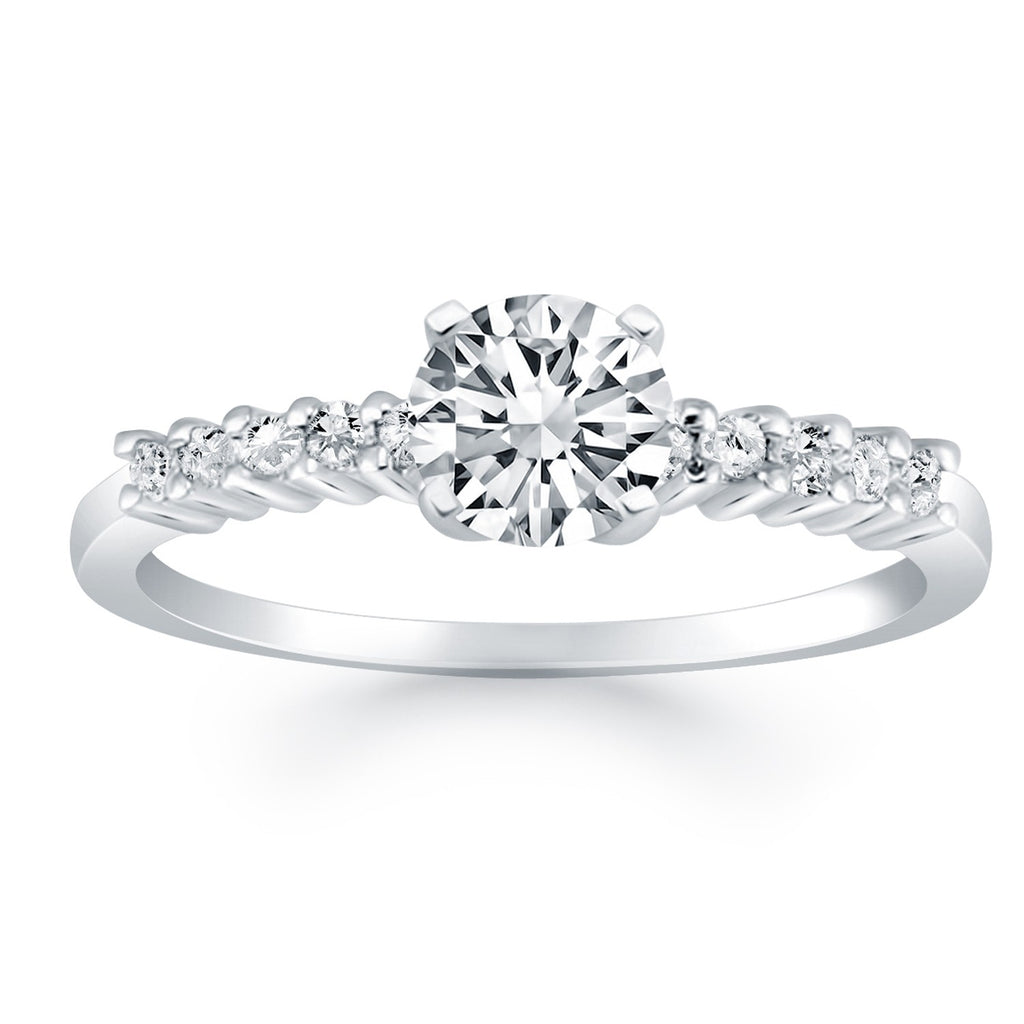 14k white gold engagement ring featuring shared prong-set diamonds in a modern round design.