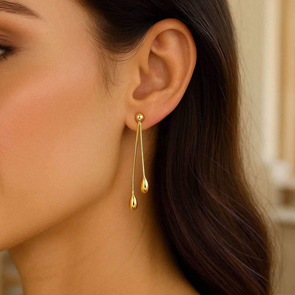 14k yellow gold polished double drop earrings featuring elegant stud design and refined silhouette for a luxurious look.