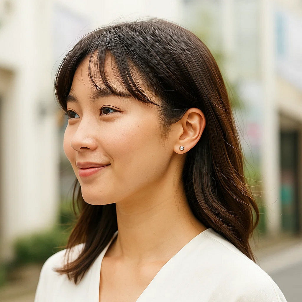 14k white gold modern round stud earrings, 5.0 mm, showcasing timeless elegance and refined craftsmanship.