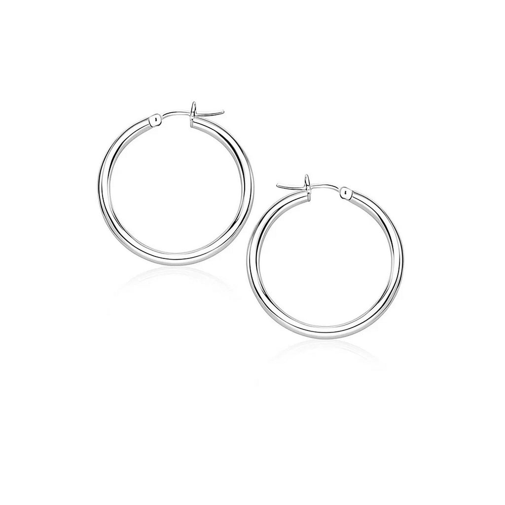 14k white gold polished hoop earrings with a sleek modern design, perfect for elegant everyday wear.
