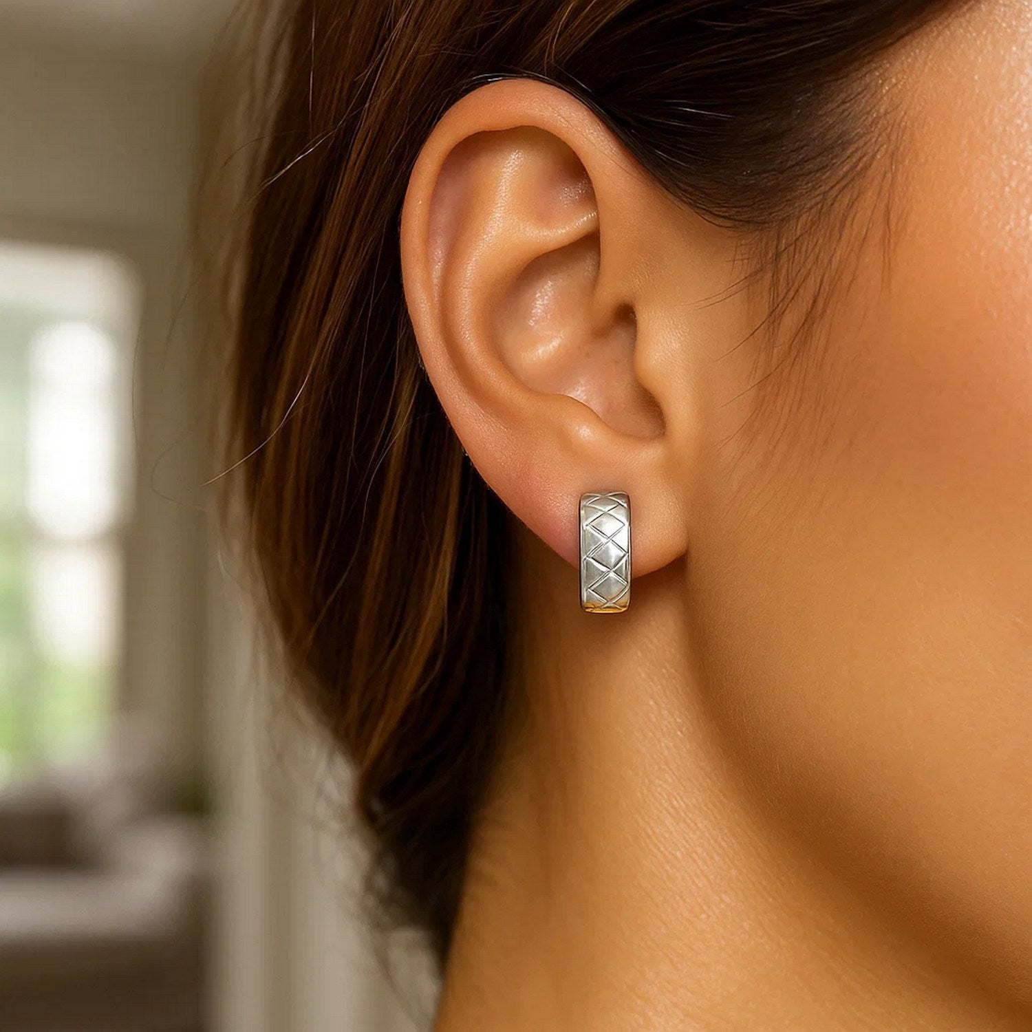 14k two-tone gold diamond textured hoop huggie earrings showcasing modern elegance and luxurious craftsmanship.