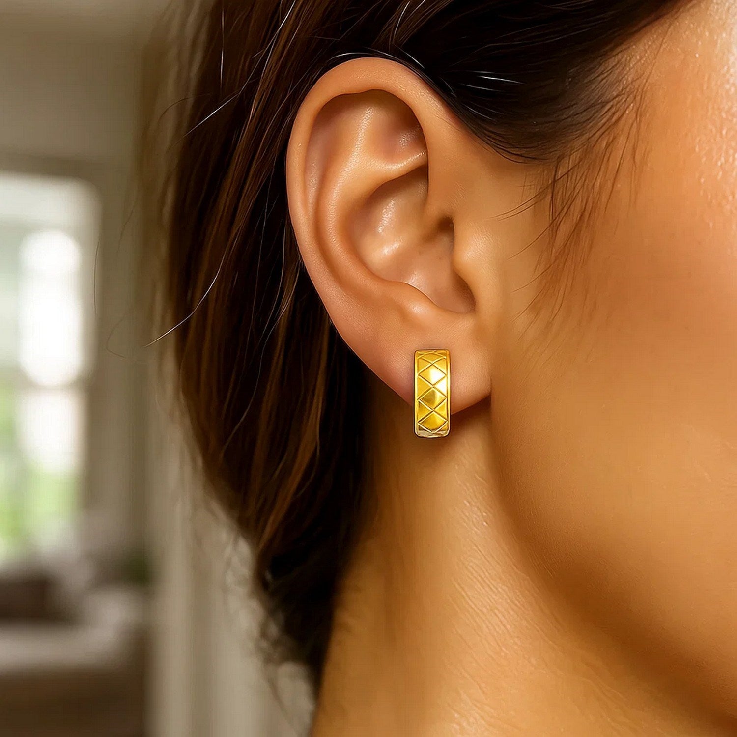 14k two-tone gold diamond textured hoop huggie earrings, showcasing modern elegance and luxurious craftsmanship.