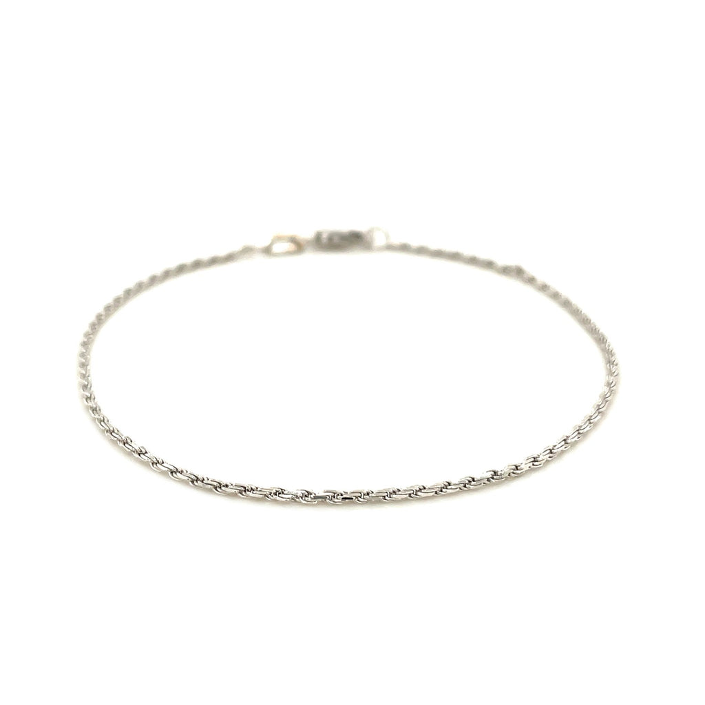 Elegant 14k white gold diamond cut rope bracelet showcasing intricate chain design and luxurious shine.